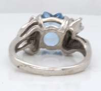 Pleasing White Gold Blue and White CZ Star Ring