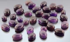 Heavy 270ct collection of deep violet Amethyst cabochons