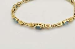 LADIES 14 KT YELLOW GOLD TOPAZ AND DIAMOND BRACELET