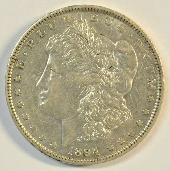 Flashy key date 1894-O Morgan Silver Dollar. AU/Slider