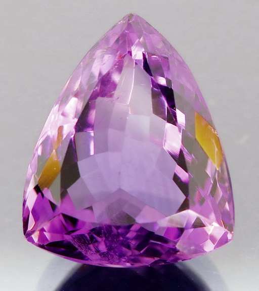 Glittering 11.63ct trillion cut Bolivian Amethyst
