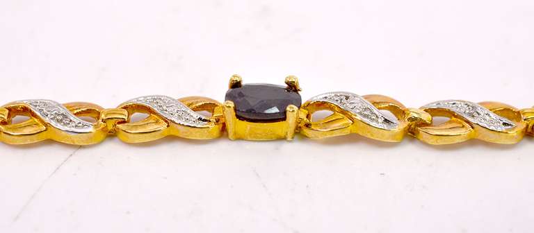 Gold Plated Sterling Silver Black Gemstone Infinity Bracelet.