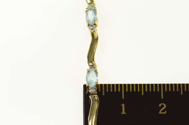 14K Yellow Gold Blue Topaz Diamond Accent Wavy Tennis Bracelet