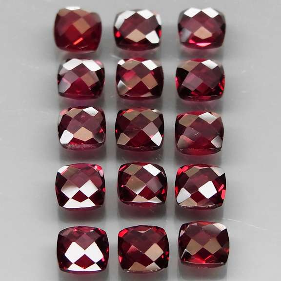 Double checker cut! 6.97ct violet red Rhodolite Garnet set