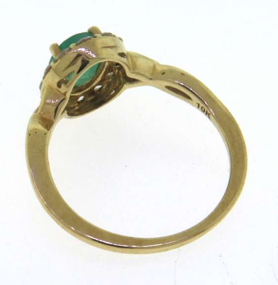 Oval Cut Emerald and CZ Ring in Yellow Gold