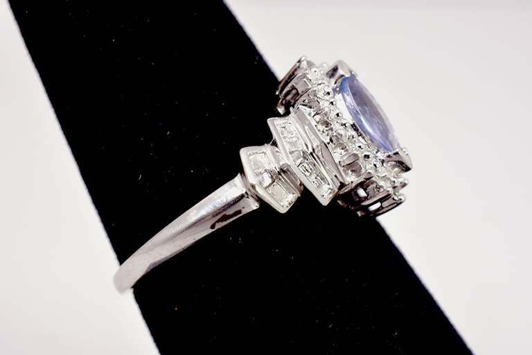 Sparkling Purple Gemstone Ring in White gold with Diamonds
