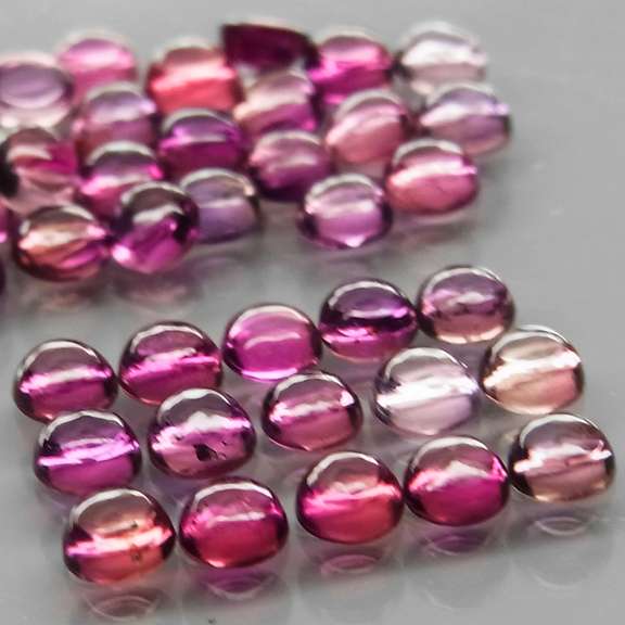 Fancy colored 5.12ct Songean Sapphire cabochon parcel