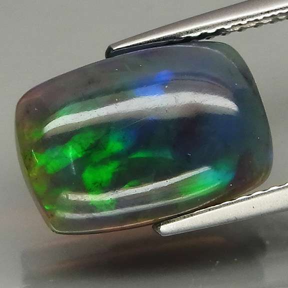 Magnificent 2.25ct floral flashing Black Opal
