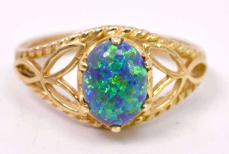 Ravishing Cabochon Opal Set in Intricate Yellow Gold Ladies Ring