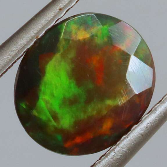 Full body flashing 1.72ct Welo Black Opal