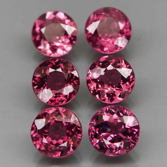 Ravishing 6.51ct rich pinkish violet Rhodolite Garnet set