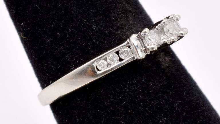 Fancy White Gold ring with Intricately Set Diamonds