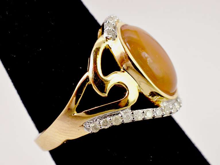 Fabulous 2.57CTS Ethiopian Opal Set in Gold Plated Sterling Silver Ring With .26CTW of Accenting Diamonds