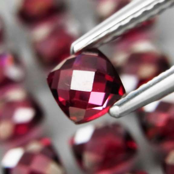 Double checker cut! 6.97ct violet red Rhodolite Garnet set