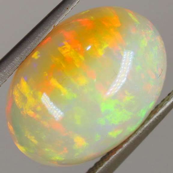 Tremendous 8.90ct full cover flashing Welo Opal