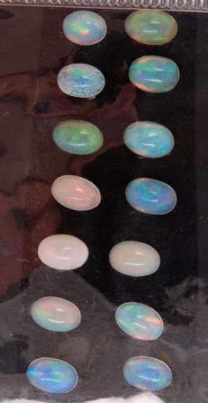 Charming Group of 14 Oval Cut Ethiopian Opal Gemstones, 4.16cts