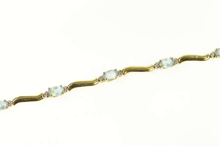 14K Yellow Gold Blue Topaz Diamond Accent Wavy Tennis Bracelet
