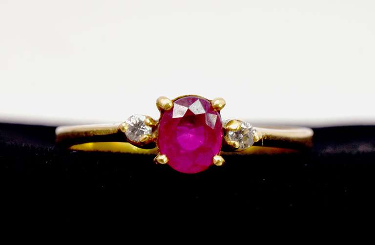 Lovely Oval Cut Ruby Set in 18K Yellow Gold Diamond Ring