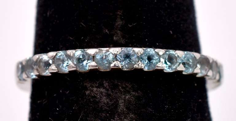 Brilliant Ladies Band Style Ring with Aquamarine Gemstones in 18K White Gold