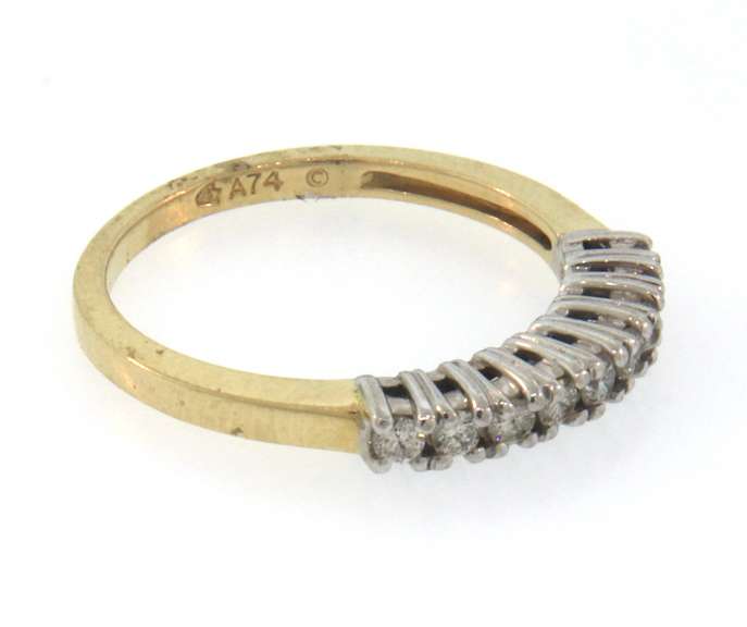 Pretty 14k yellow gold round diamond band ring