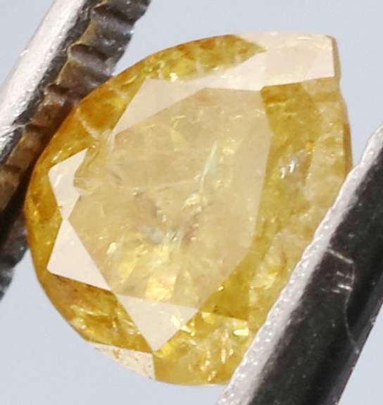 Rare .27ct pear cut canary yellow Diamond