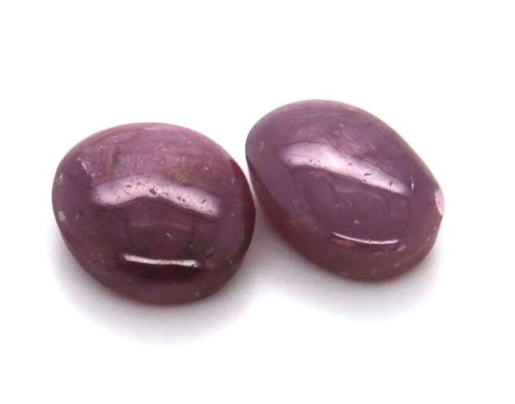 Pair of Oval Shaped Star Ruby cabochon Gemstones, 16.78ct