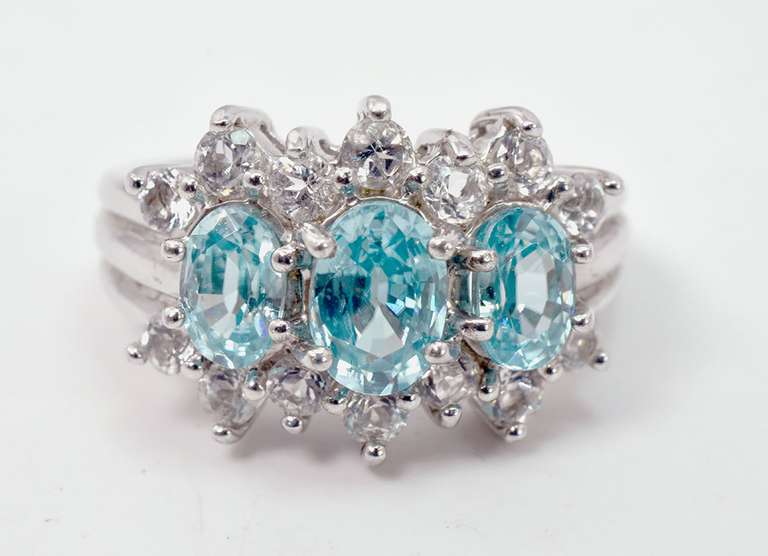 Bright Blue Crystals Set in Sterling Silver Ring With White Crystal Accents