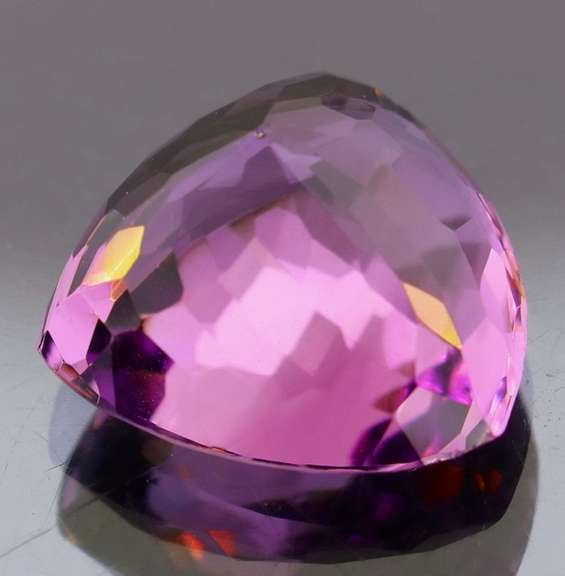 Glittering 8.01ct trillion cut Bolivian Amethyst