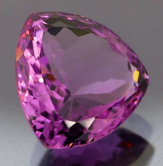 Glittering 8.01ct trillion cut Bolivian Amethyst