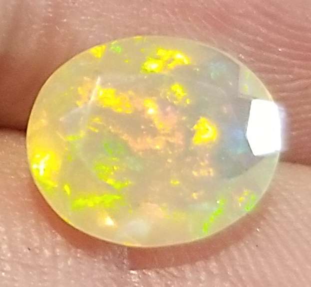 Vibrant 1.39ct floral flashing Welo Opal