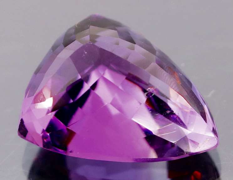 Glittering 11.63ct trillion cut Bolivian Amethyst