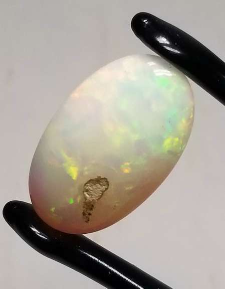 Huge 19.33ct full body flashing Welo Opal