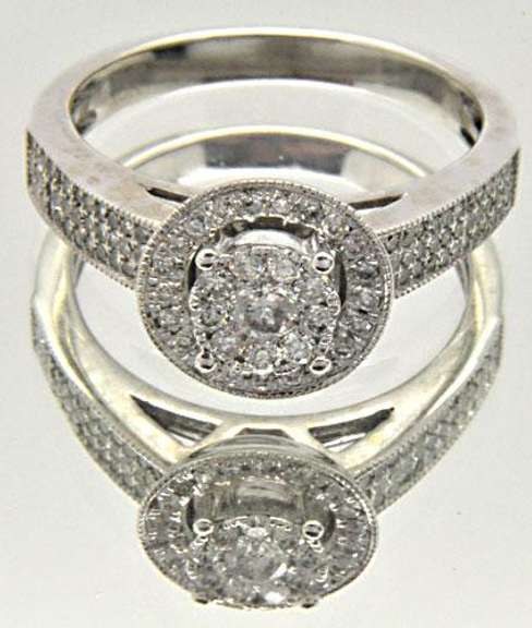 LADIES 14 KT DIAMOND BAND 1.00 CARAT TOTAL WEIGHT.
