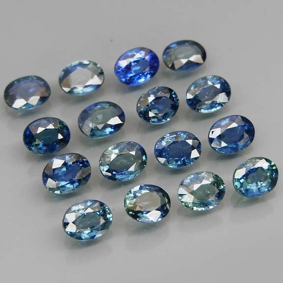 Heated only! 3.89ct blue green Sapphire set