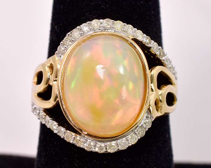 Opulent 3.72CTS Cabochon Opal Set in Open Shoulder Sterling Silver Ring with 0.34CTW Accenting Diamonds