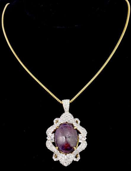 Inspiring Huge 38.00CTS Cabochon-Cut Star Ruby and 4.50ctw White Sapphires on Gold Plated Sterling Silver