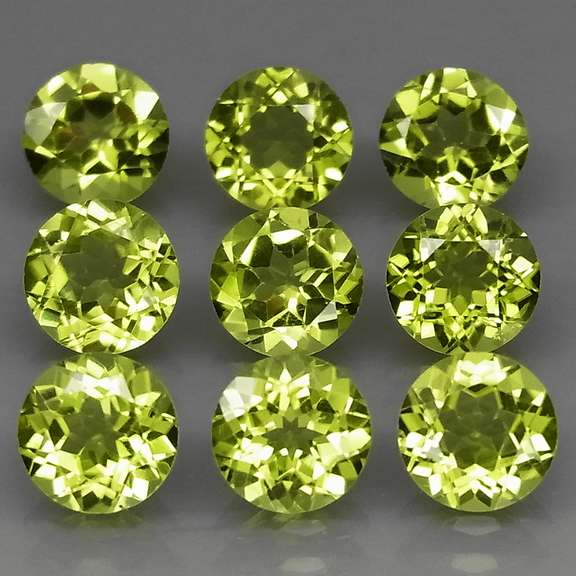 High grade 7.94ct untreated apple green Peridot set