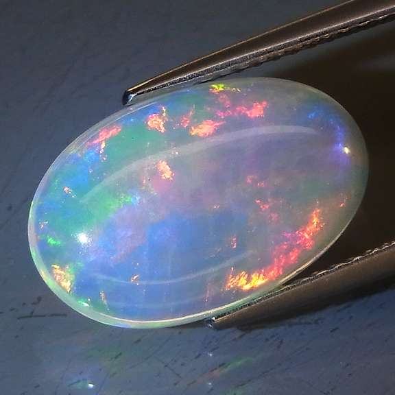 Glowing! 3.29ct full cover floral patterned Jelly Opal