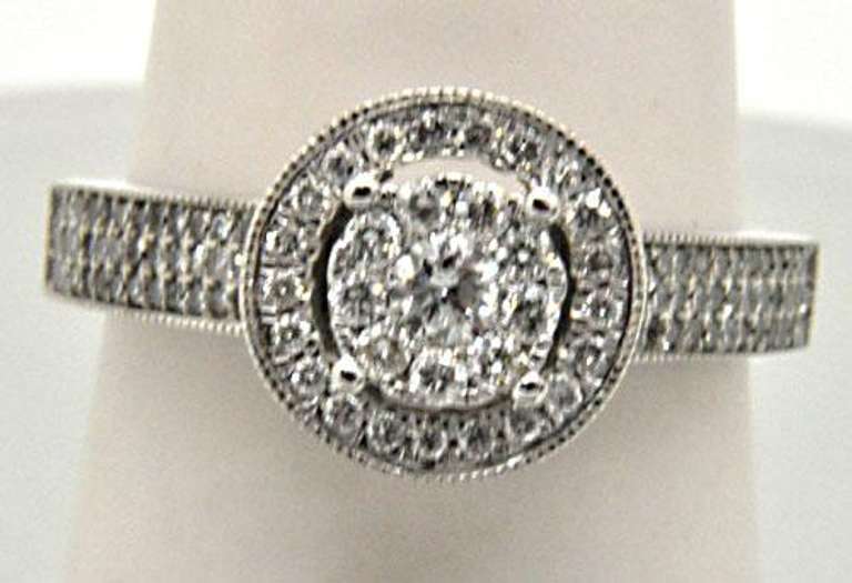 LADIES 14 KT DIAMOND BAND 1.00 CARAT TOTAL WEIGHT.