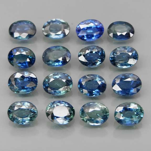 Heated only! 3.89ct blue green Sapphire set
