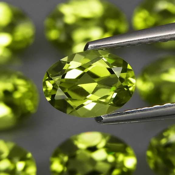 Dazzling 7.26ct untreated apple green Peridot set