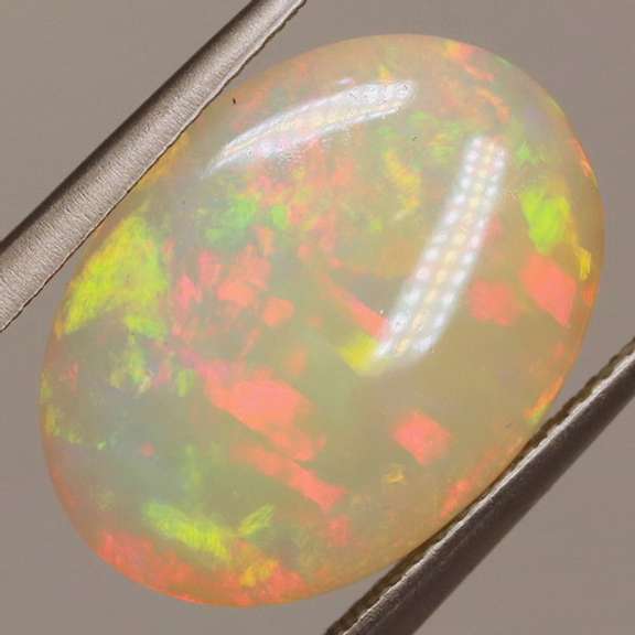 Tremendous 8.90ct full cover flashing Welo Opal
