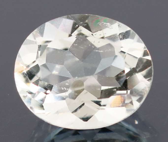 Glittering 5.85ct 10x12mm unheated green Amethyst
