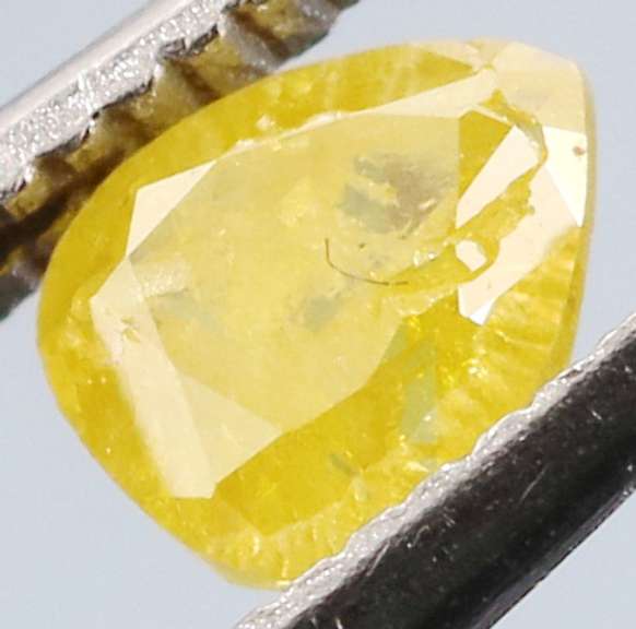 Rare .21ct pear cut canary yellow Diamond