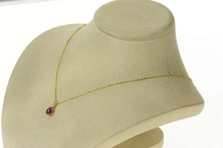 14K Yellow Gold 1.80 Ctw Oval Star Ruby Diamond Accent Pendant