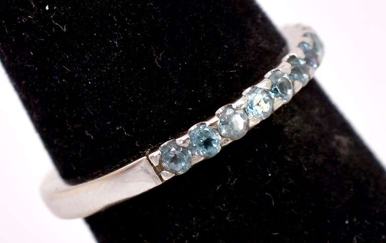Brilliant Ladies Band Style Ring with Aquamarine Gemstones in 18K White Gold