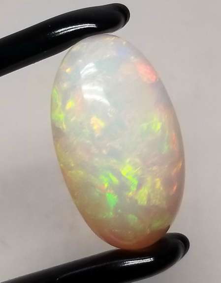 Huge 19.33ct full body flashing Welo Opal
