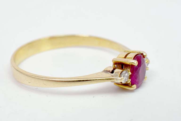Lovely Oval Cut Ruby Set in 18K Yellow Gold Diamond Ring