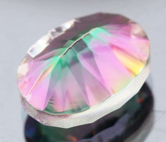Rainbow color 10.08ct concave cut Mystic Quartz