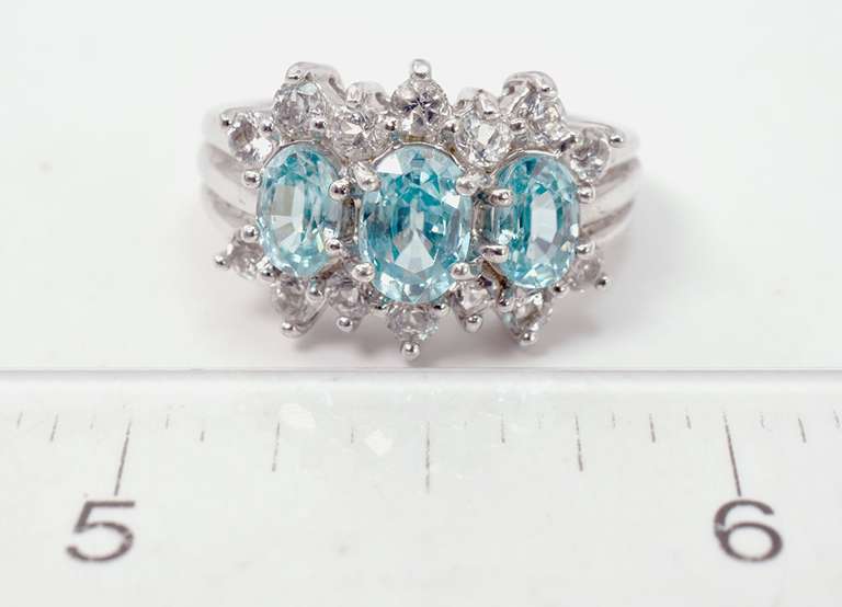 Bright Blue Crystals Set in Sterling Silver Ring With White Crystal Accents